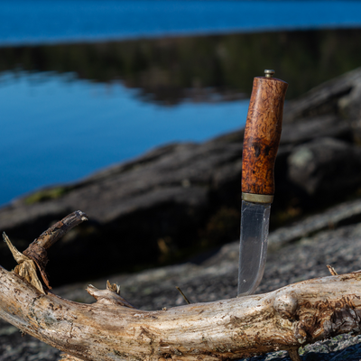How can you use a survival knife in emergencies?